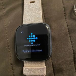 Fitbit versa 2 smartwatch with lots of accessories and could be men’s or women’s